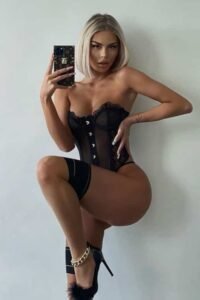 Elegant escort Anette Amsterdam offering GFE with passionate kiss Hot diva escort Anette in Amsterdam romantic role-play scene
