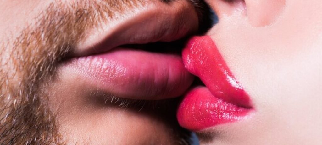 French kissing with luxury escort in Amsterdam suite