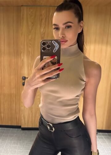 Effortless Seduction – Youilia in Black Leather Pants | Elite Escort in Amsterdam