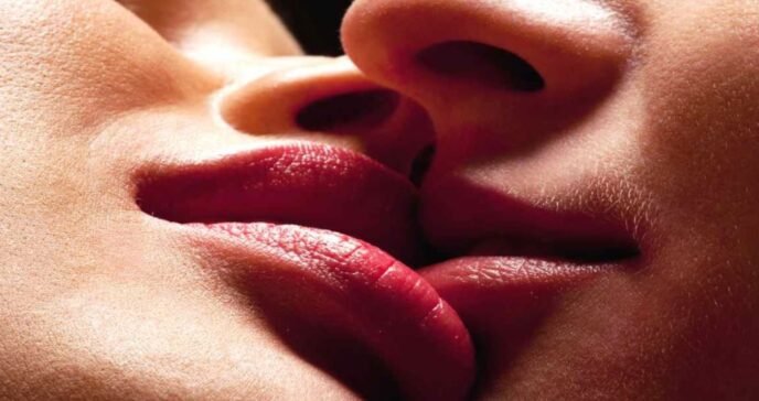 French kissing moment in luxury escort suite