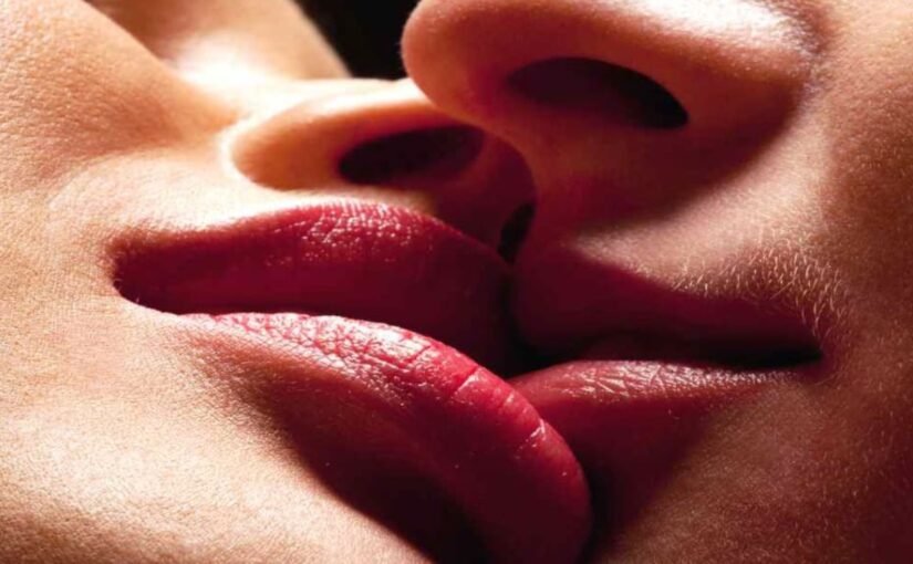 French kissing moment in luxury escort suite